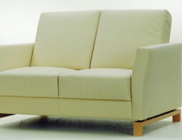 Beige soft and snug love seat